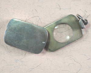 Smallest English Dictionary in the World. Comprising: besides the ordinary & newest words in the language, short explanations of a large number of scientific, philosophical, literary & technical terms. Bryce, David & Son. Glasgow. 1893. SILVER LOCKET