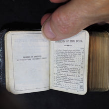 Load image into Gallery viewer, Book of Common Prayer and Administration of the Holy Communion [with] Hymns Ancient and Modern Oxford University Press. Humphrey Milford Oxford. 1917. Diamond 128mo. 2 volumes in 1. Silver plaque.
