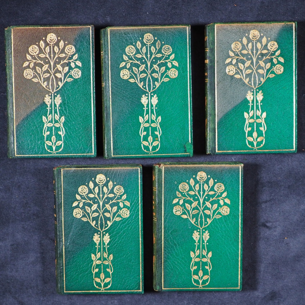 Dickens, Charles Christmas Stories. Birdsall & Sons [Northampton]. Circa 1908. Complete five volume set on original oak book display.