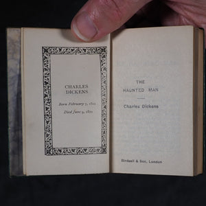 Dickens, Charles Christmas Stories. Birdsall & Sons [Northampton]. Circa 1908. Complete five volume set on original oak book display.