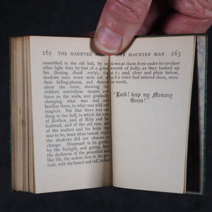 Dickens, Charles Christmas Stories. Birdsall & Sons [Northampton]. Circa 1908. Complete five volume set on original oak book display.